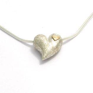 Silver heart pendant w/ small 14 ct heart