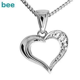 9 kt hvidgulds hjerte m/ 1 stk 0,005 ct diamant